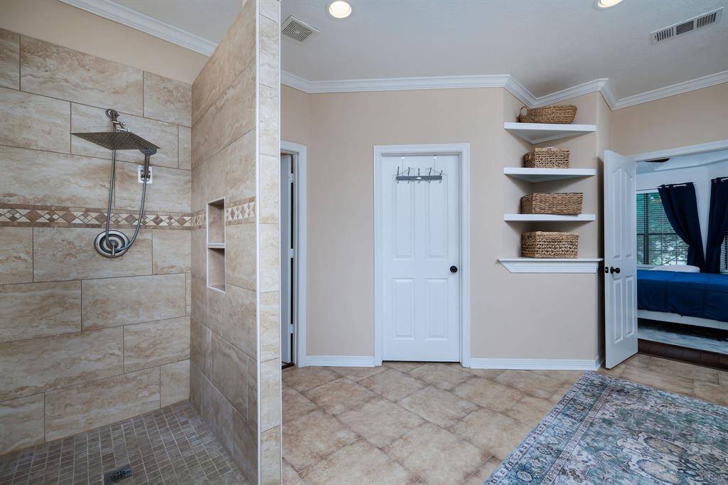 A view of the large primary walk-in shower.