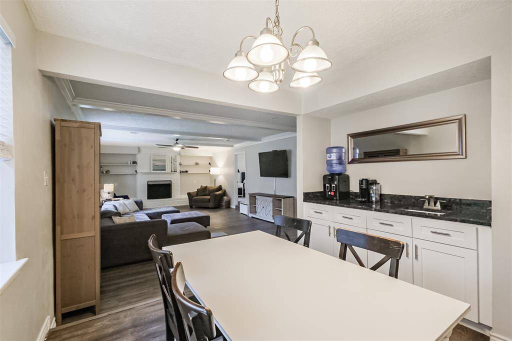 Another view of the dining area and our first look into the kitchen. To the right is the in-home utility room.