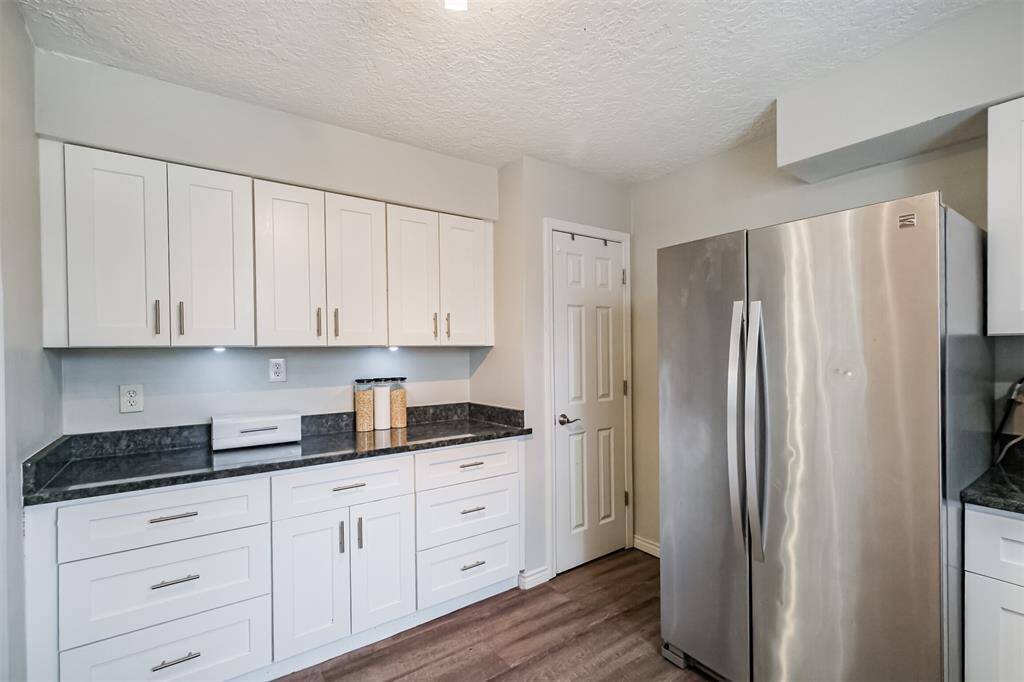 Turning again we see the pantry area and the plethora of counter space available.