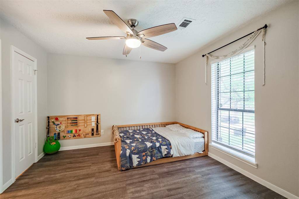 A view of one of the bedrooms upstairs. All the rooms are generously sized and have a closet space.