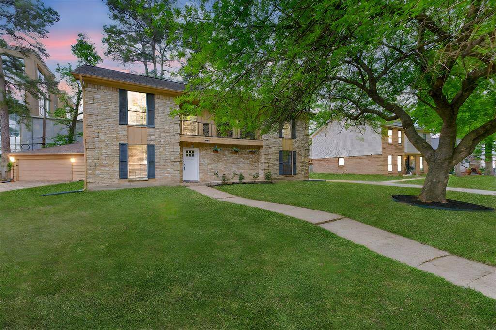 Let's start from the beginning! A Texas-sized oak tree makes this house a perfect place to call home!