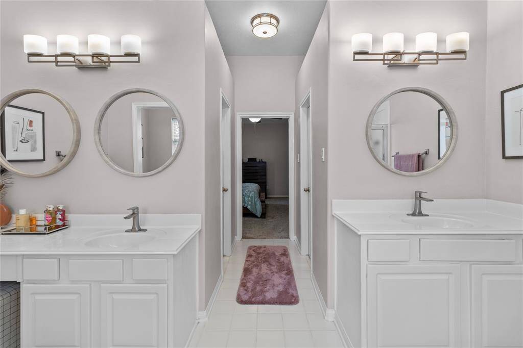 Separate vanities in primary.