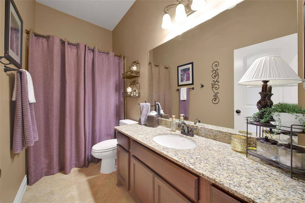 The two secondary rooms in the front of the home share a full bathroom with a bath/shower combo.