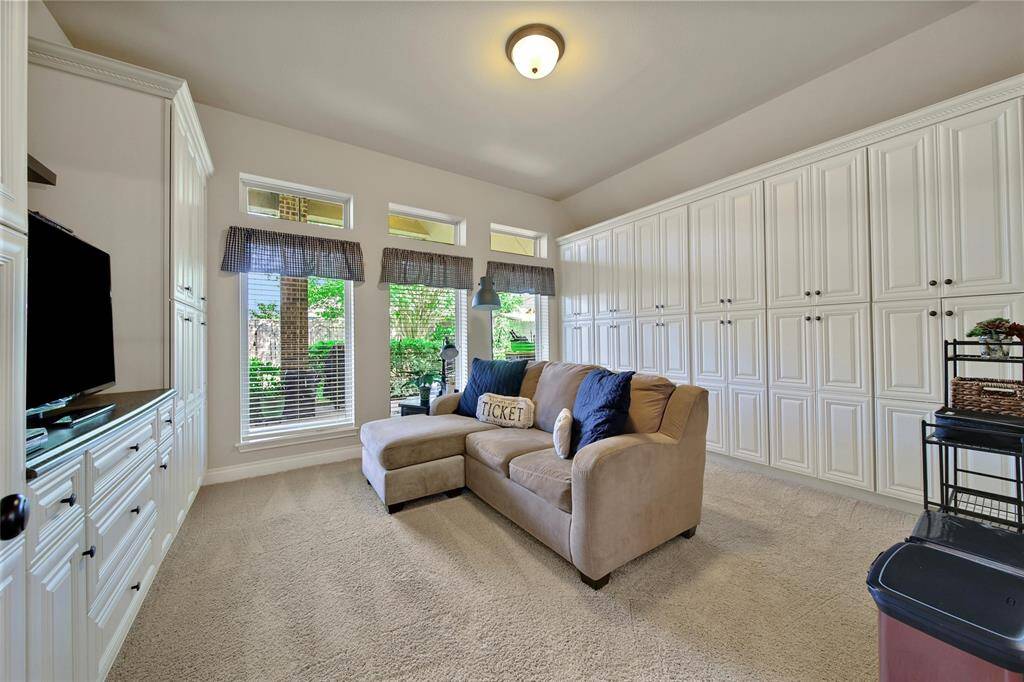 Customs cabinets in the media room creates a space with endless possibilities.