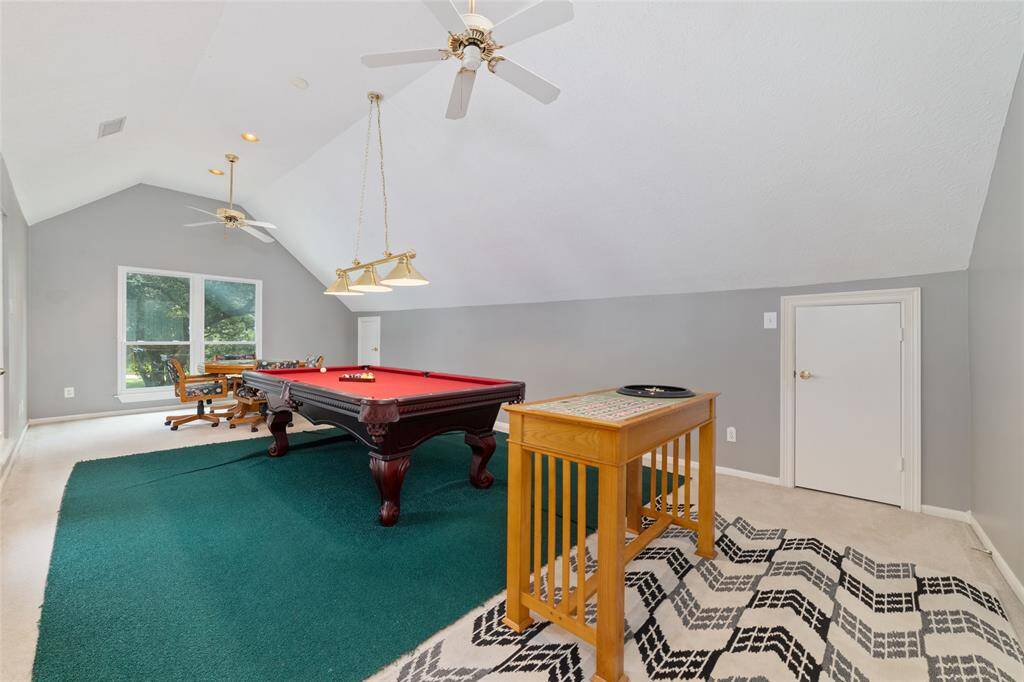 Upstairs Game/Bedroom.  The Roulette table, Pool table and Poker table are all included.  This room has a closet and a door to the outdoor deck.