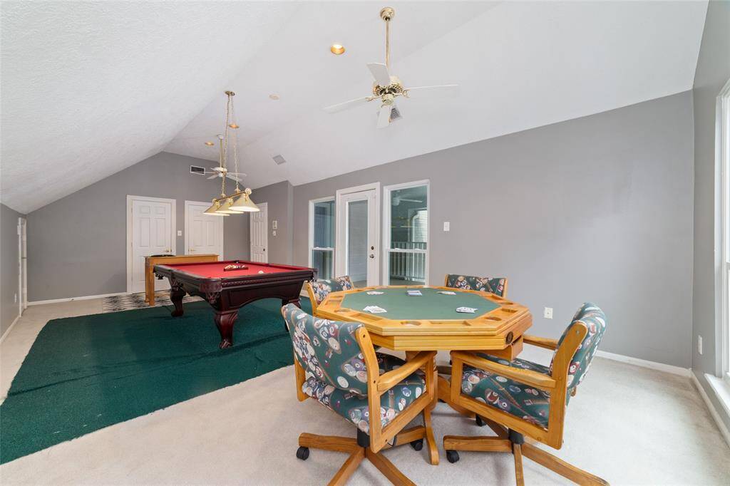 Another angle of the upstairs Flex/Bedroom.  And the door to the outside deck.
