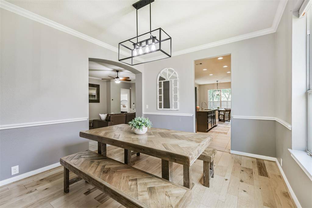 Don't miss that gorgeous flooring. The layout of the home provides functionality with the dining room flowing into the kitchen.