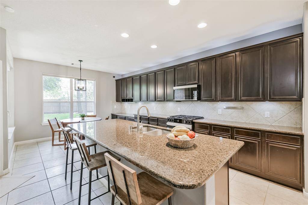 Beautiful neutral granite countertops. Lots and lots of counter space and cabinets!