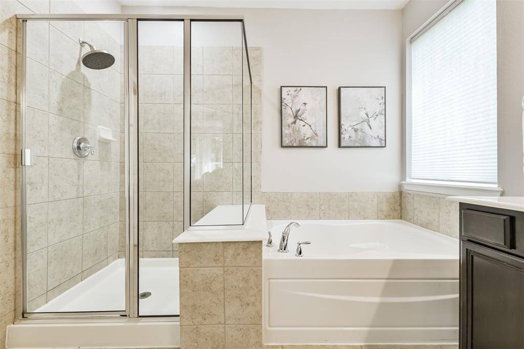 Large separate shower and a soaking tub.