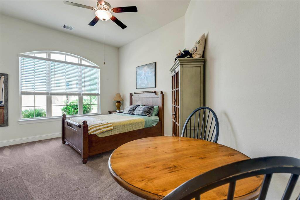 One of the secondary bedrooms that is connected by a jack n Jill bathroom.