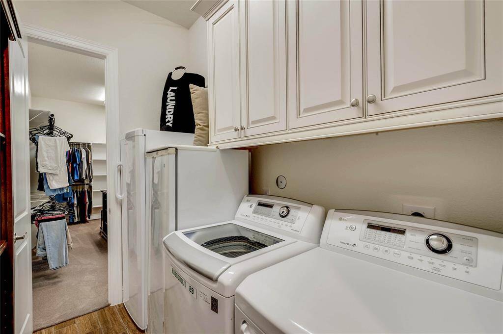 This is one of my favorite parts of the house, the laundry room that connects to the primary suites closet! Best thing ever!
