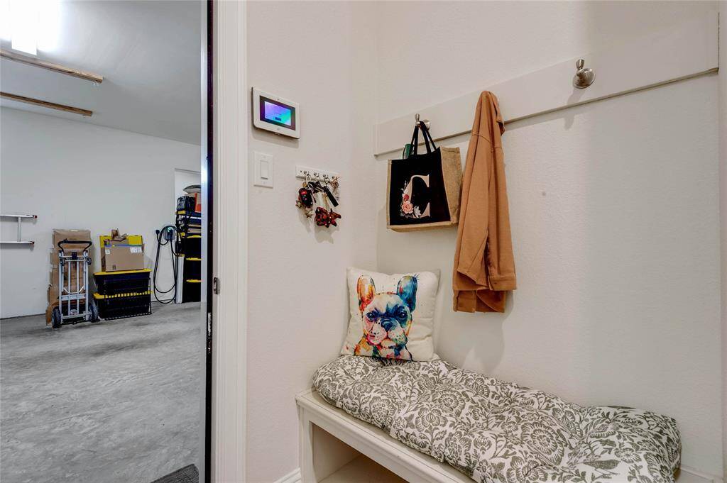Cute mud room space once you enter the home from the oversized garage.