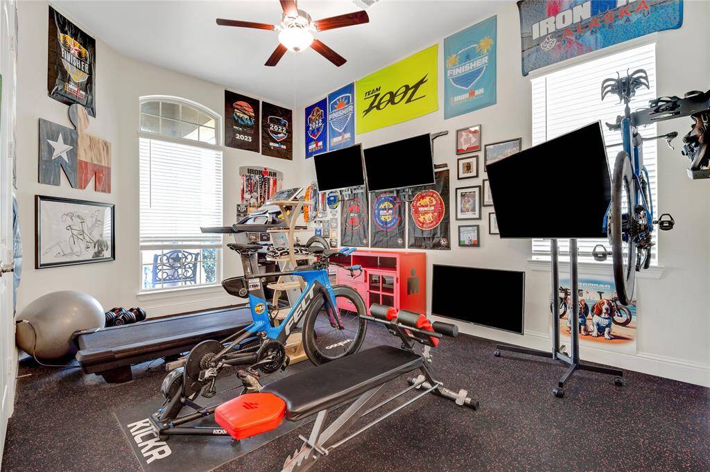 This is the 4th bedroom that has specialized flooring as it is being used as an exercise room.   What a perfect set up to get your sweat on.