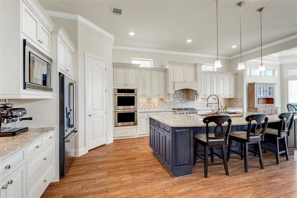 Tah-Dah!   This is the wow factor.   The enormous kitchen is beyond words.   SO much storage and granite counter space you will not know what to do with it.