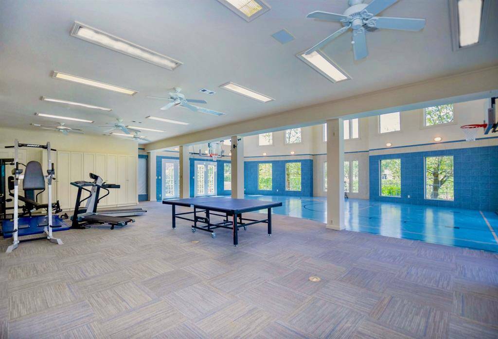 THERE IS A HOME GYM ATTACHED TO THE BASKETBALL COURT!