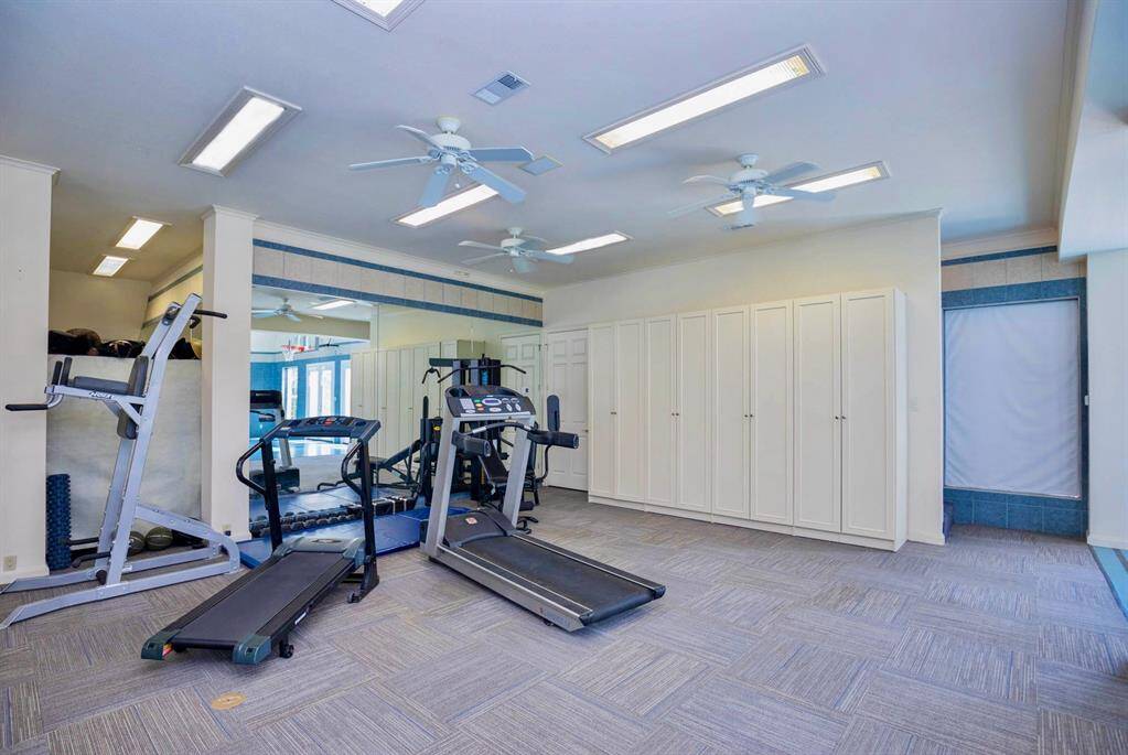THIS HOME GYM AREA HAS PLENTY OF ROOM FOR YOU TO CUSTOMIZE TO FIT YOUR NEEDS!