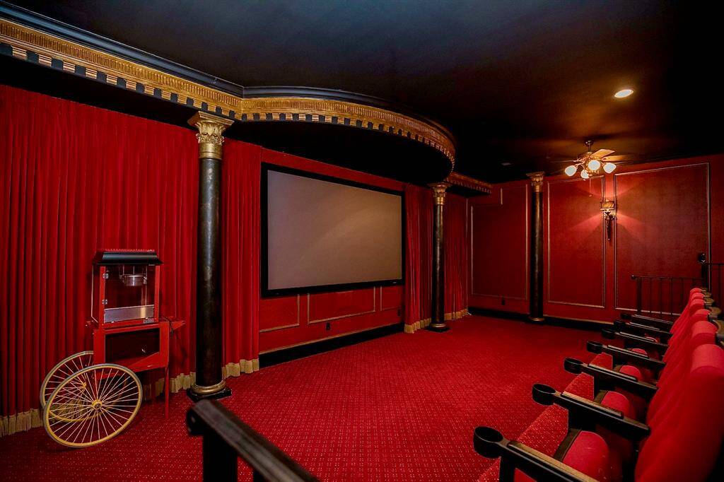 THIS HOME INCLUDES A FULL-SIZED THEATER ROOM COMPLETE WITH THEATER SEATING!!!