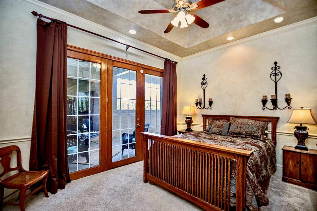 THIS SECONDARY BEDROOM HAS A PRIVATE ACCESS TO THE SECOND-FLOOR PATIO!