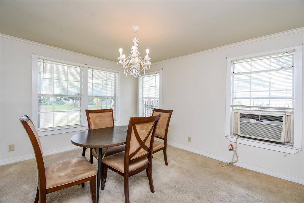 Luxurious Carpeted Dining Room with window a/c