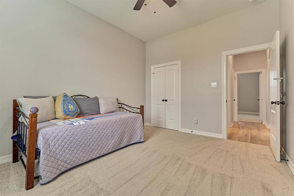 Another spacious secondary bedroom.