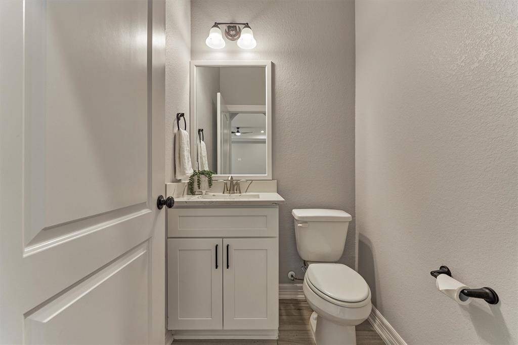 Dedicated half bath for guests.