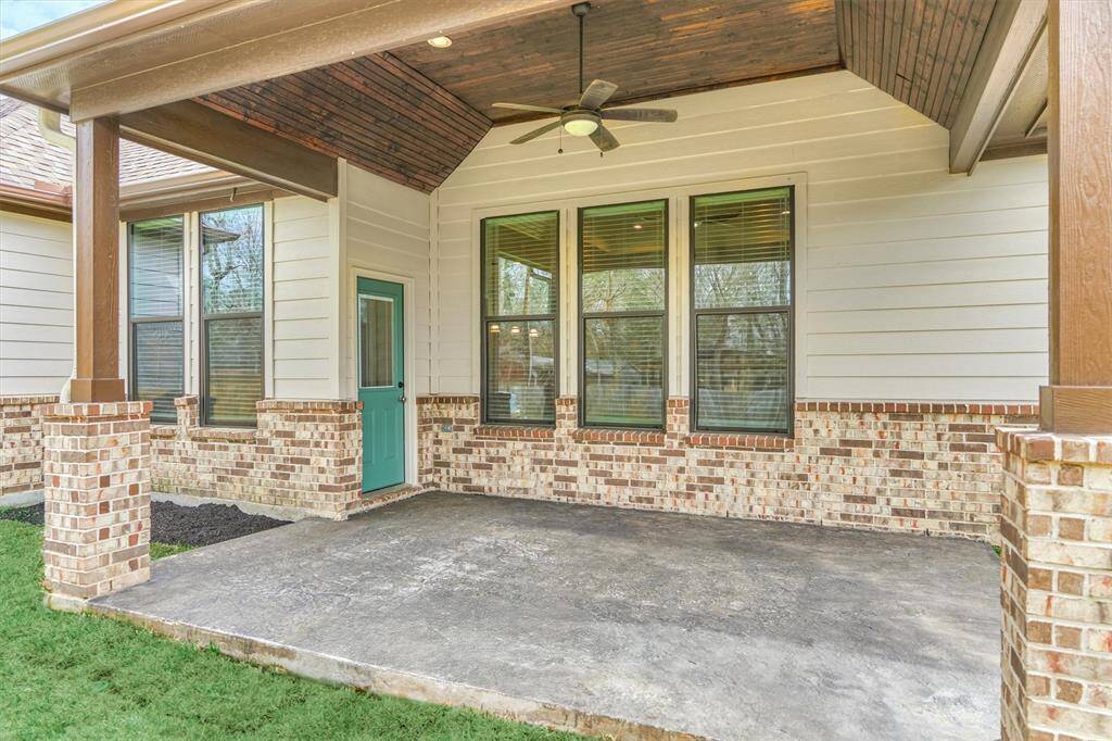 Not stone was left unturned in the beauty of this home design, including brick wainscoting around the entire home, and custom beadboard finish on the vaulted ceiling.