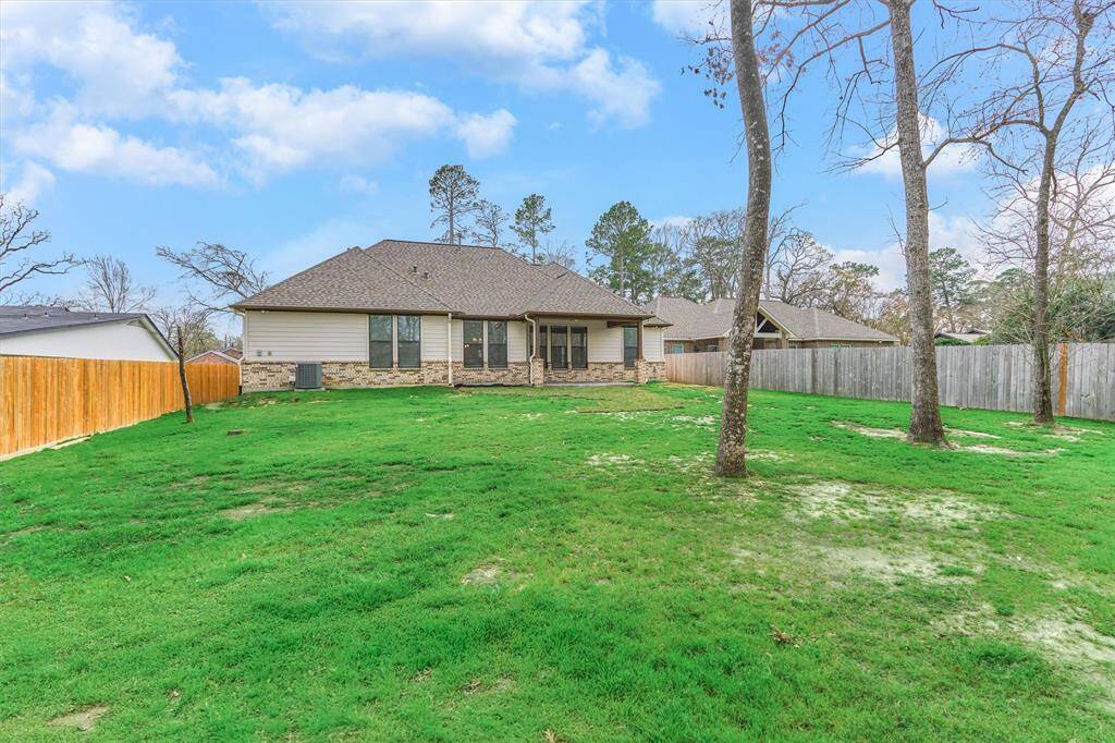 WOWZA! Bring on the fun with ample room for family, pets, play structures, gardening, and recreational activities!