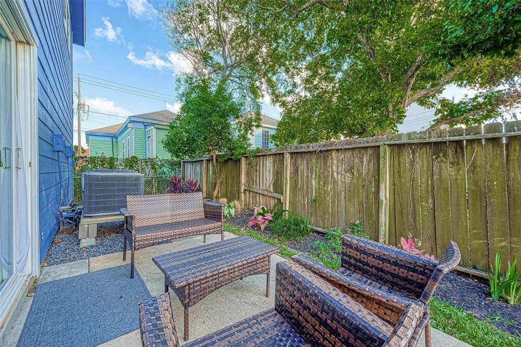Fully fenced for added privacy, this space offers a welcoming retreat for outdoor relaxation.