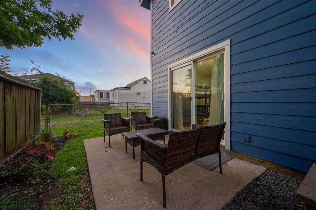 Another twilight perspective captures the inviting glow of this outdoor retreat.