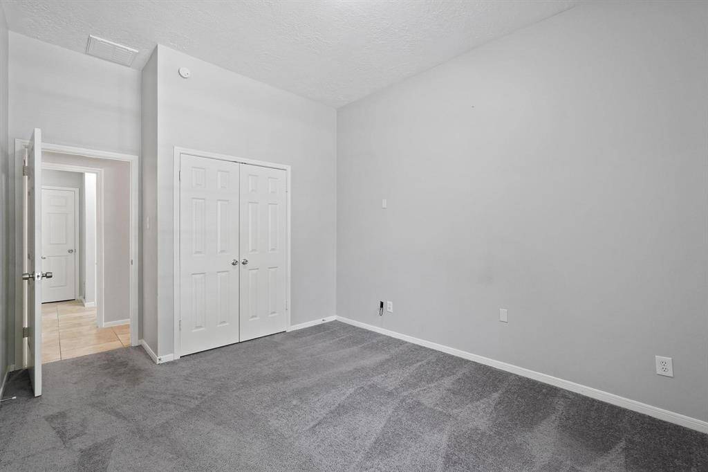 Bedroom #2. Neutral Tones throughout this adorable home!