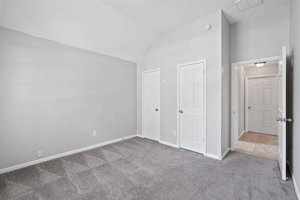 Another View of Bedroom #2. Between the Bedrooms is the Laundry Room, how convenient!