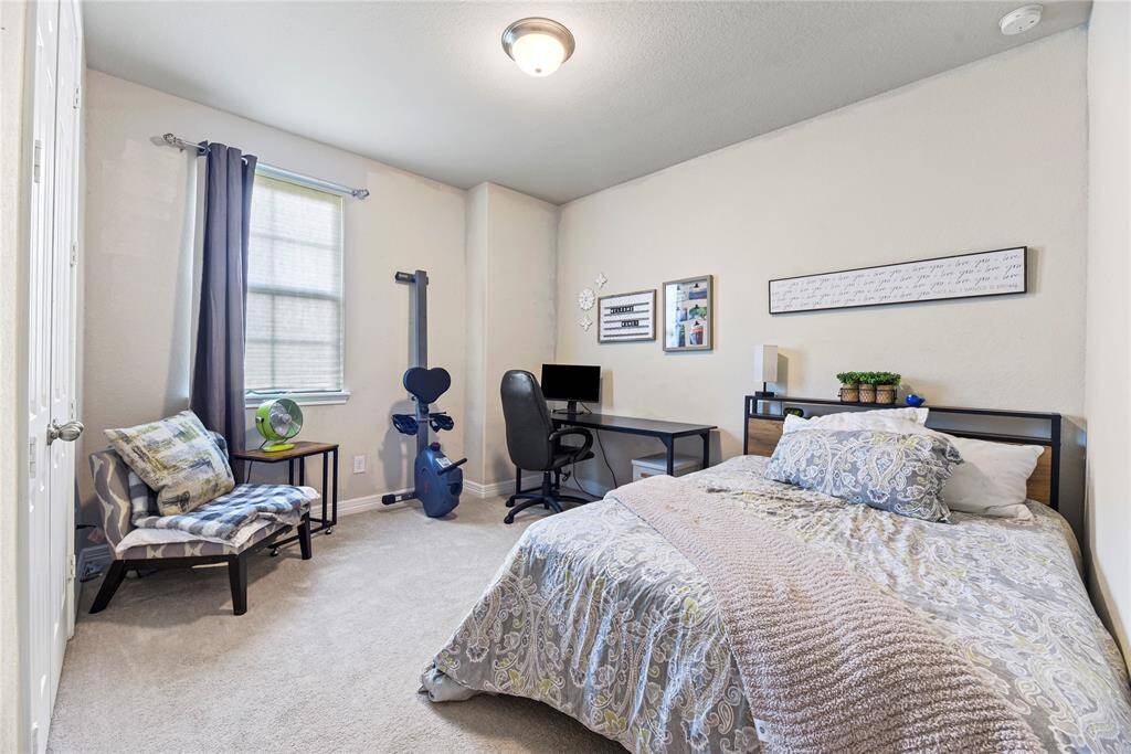 In the front of the home is a nice sized bedroom that will get natural light with the evening sun and has a wide closet for great storage!