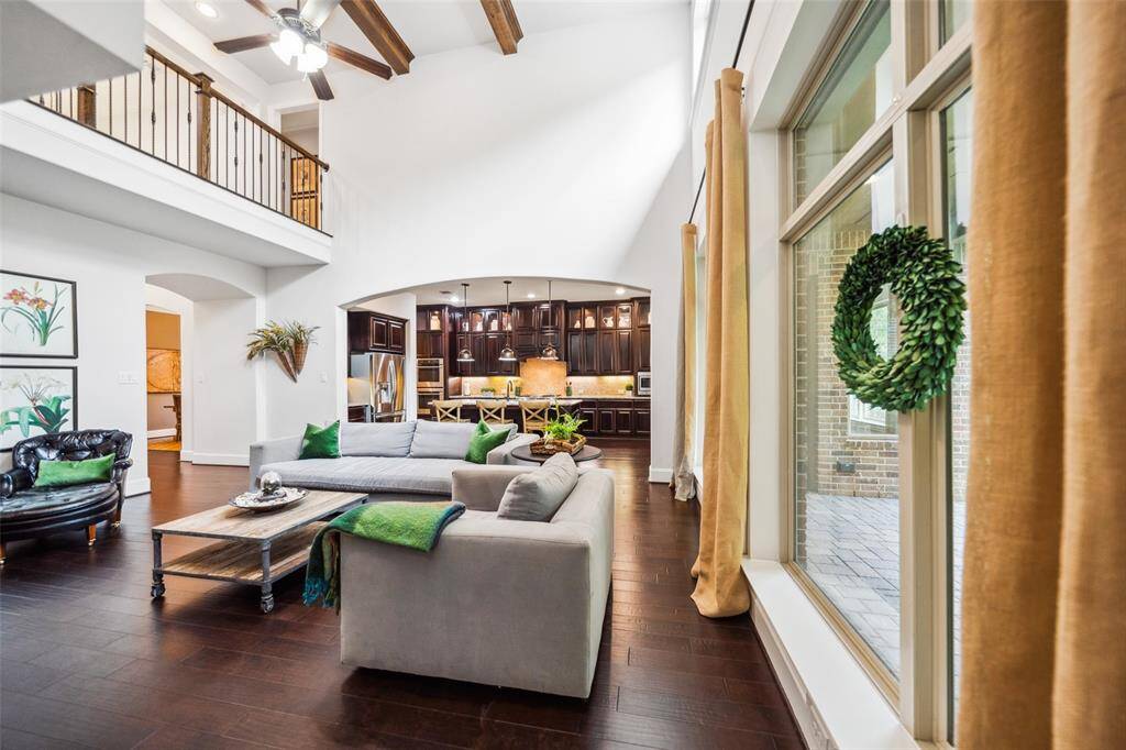 Bright and airy family room seamlessly connects to the spacious kitchen.