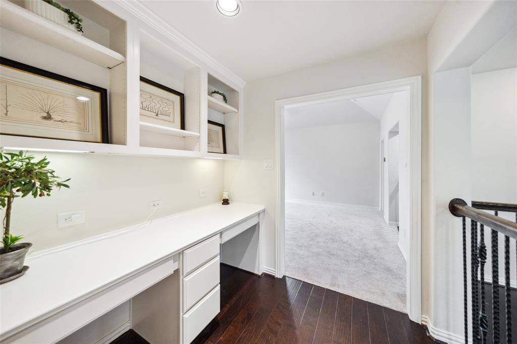Casual desk area located upstairs.