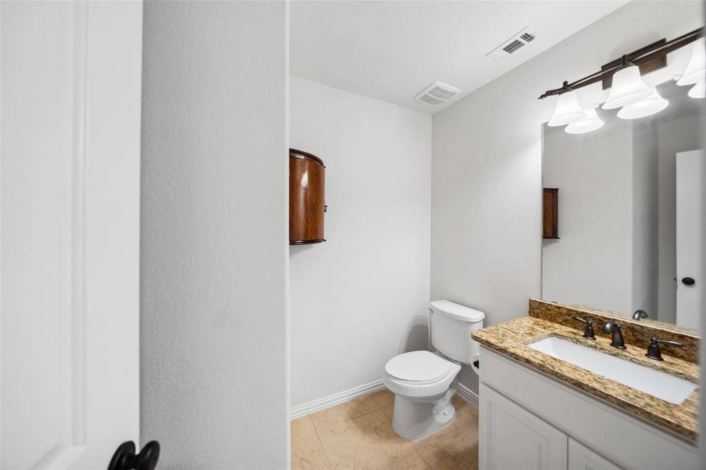 Convenient half bath located off of the desk area and Gameroom & Media rooms.