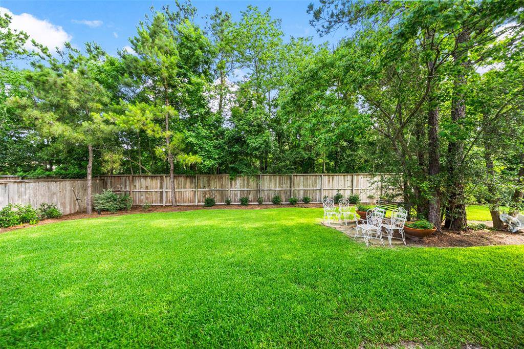 Beautiful lot offers plenty of space for your dream pool with the added privacy of mature trees & no back neighbors.