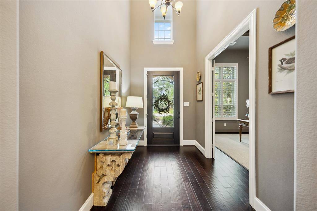 Elevate your work-from-home experience in a private study, accessed through elegant French doors off the foyer.