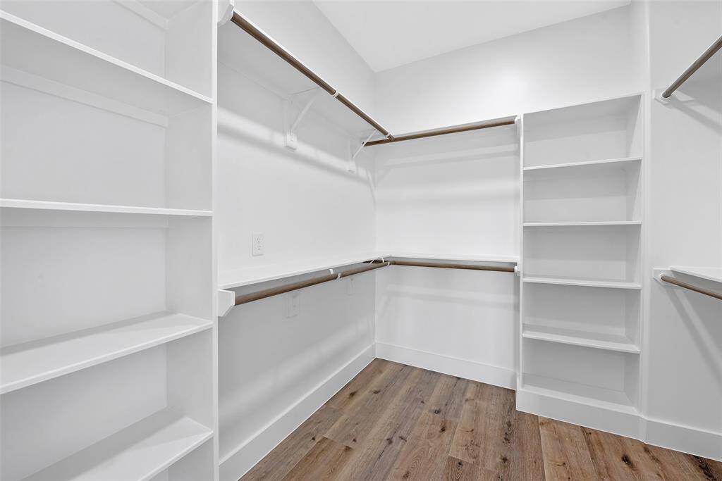The built-in closet has lots of room for your many dresses, clothes, shoes, and bags. The closet is designed with overhead space for additional storage.