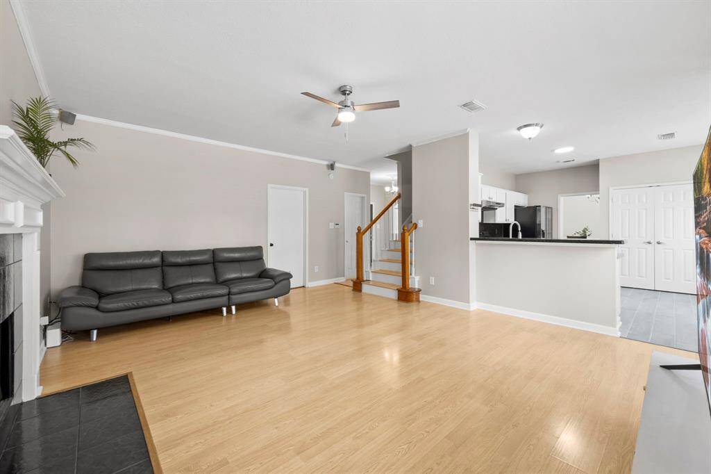 Gather the family and guests together in your lovely living room. Featuring soaring high ceilings, cozy fireplace and plenty of windows that provide plenty of natural lighting throughout the day.