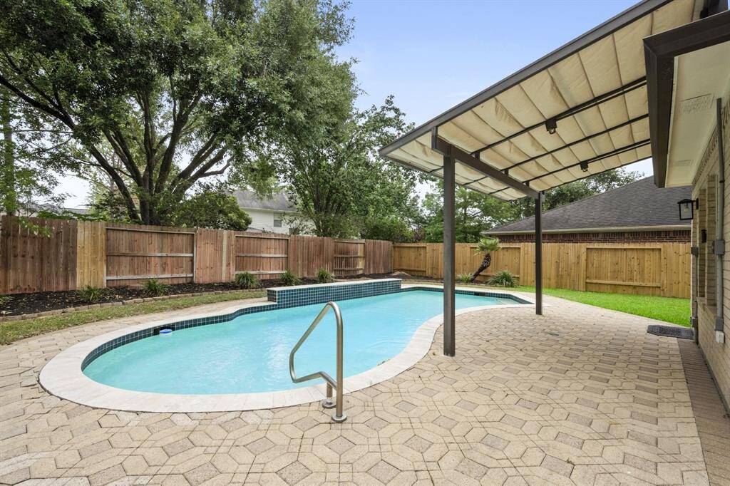 The backyard will provide you the ideal setting to enjoy the outdoors, cool of in the summer. It includes a cover patio, and a large backyard.