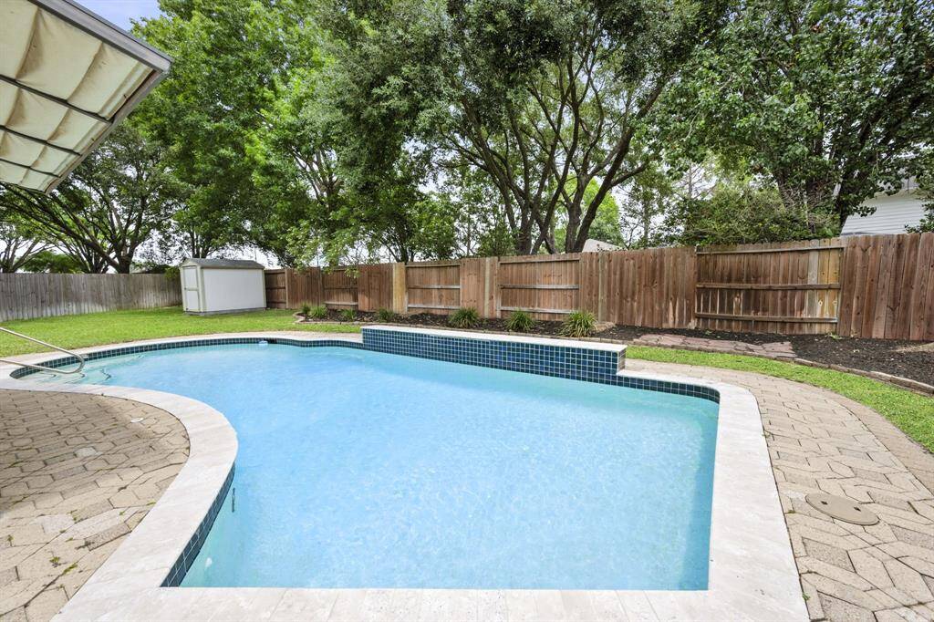 Another view of the pool and patio.