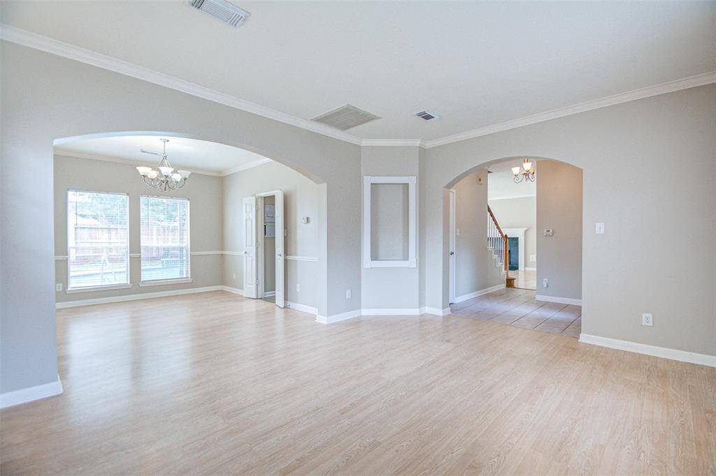 A lovely perspective from the living room with a view of the entry foyer, and the formal dining area.