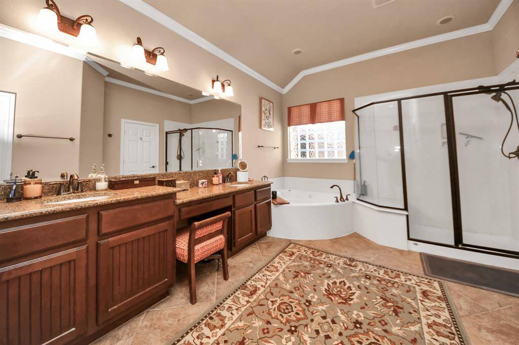 Dual sinks along with a vanity area.