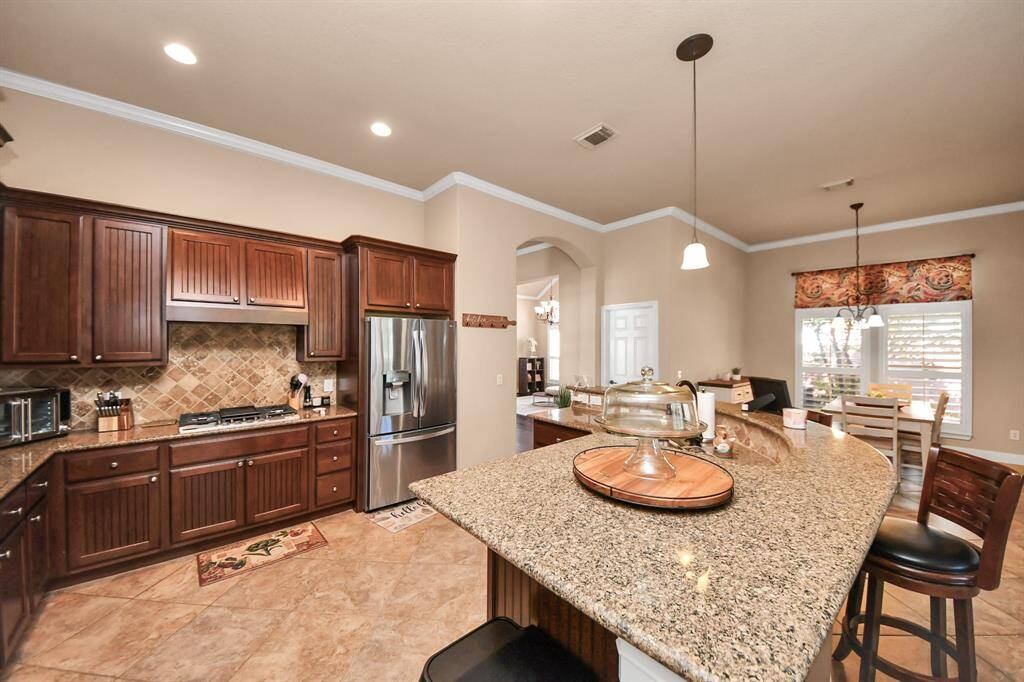 Huge Spacious Kitchen where many cooks can gather together to cook meals together.Refrigerator is included in sale.