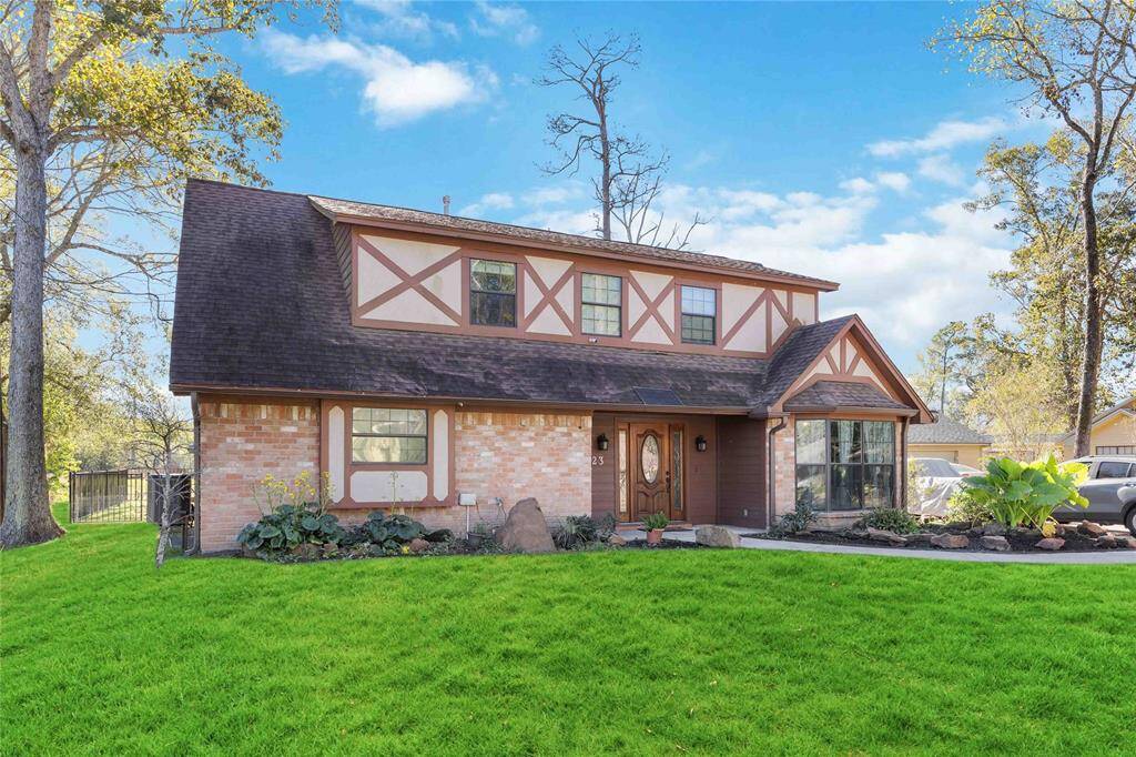 This charming two-story home features a Tudor-style exterior with brick and wood accents. It has a beautifully landscaped front yard, a welcoming porch, and large windows for plenty of natural light. Ideal for those seeking a classic and cozy suburban feel.