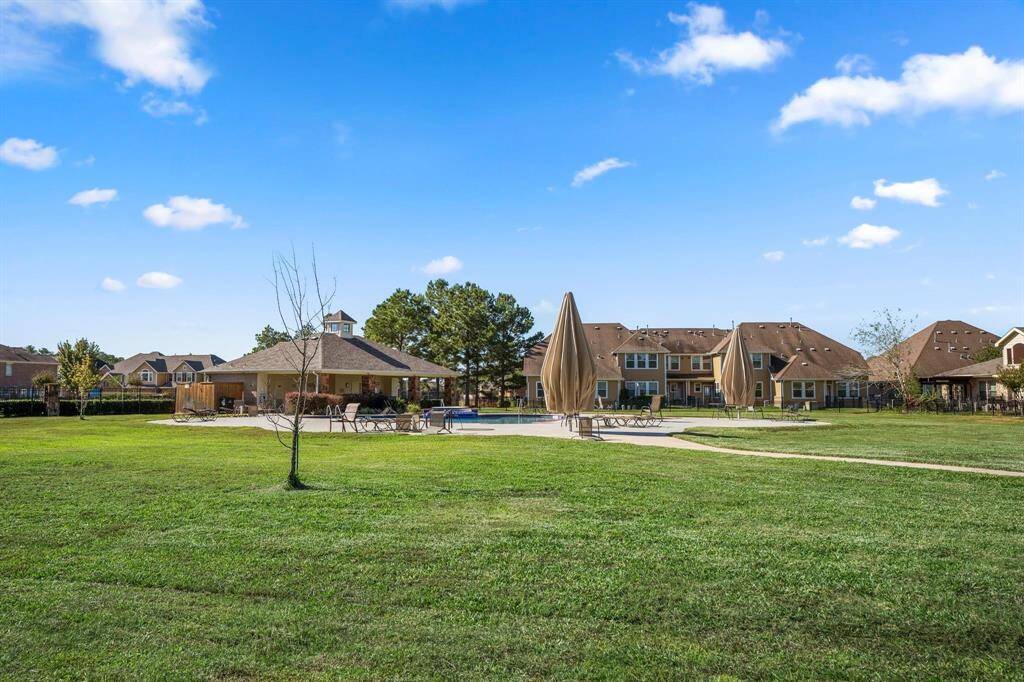 The community has a pool with a covered pavilion, as well as a large green space for residents to enjoy.