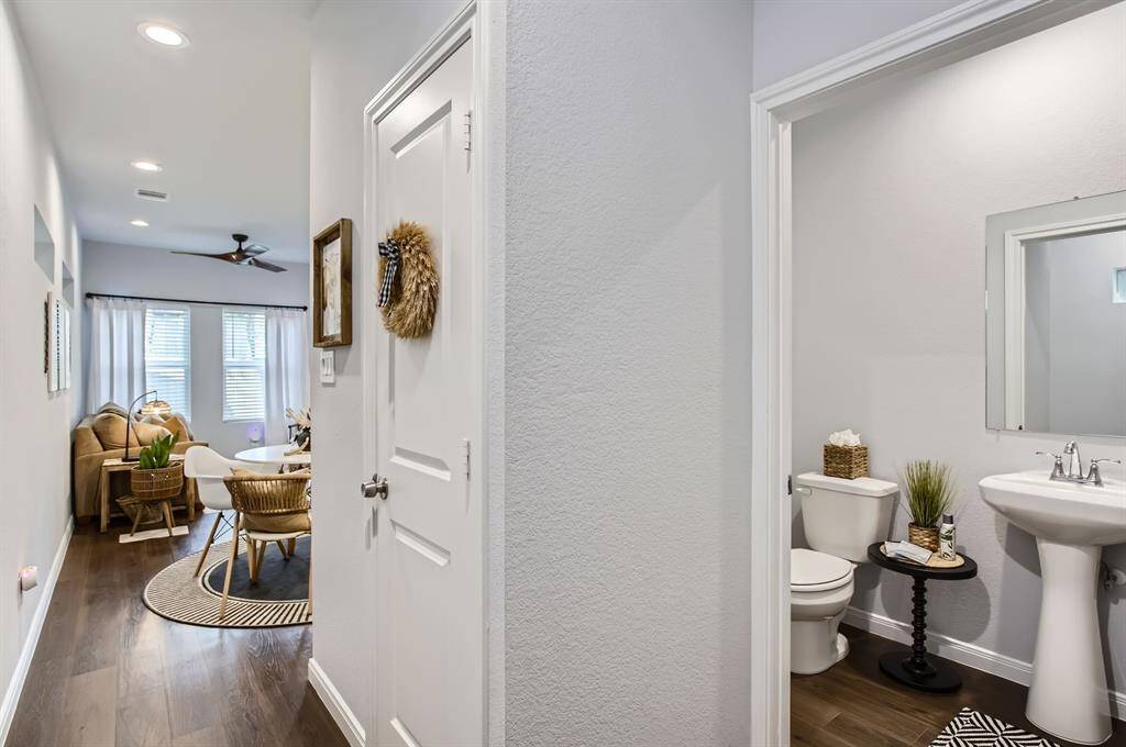 There is a half bath right off the entry hall for your guests.