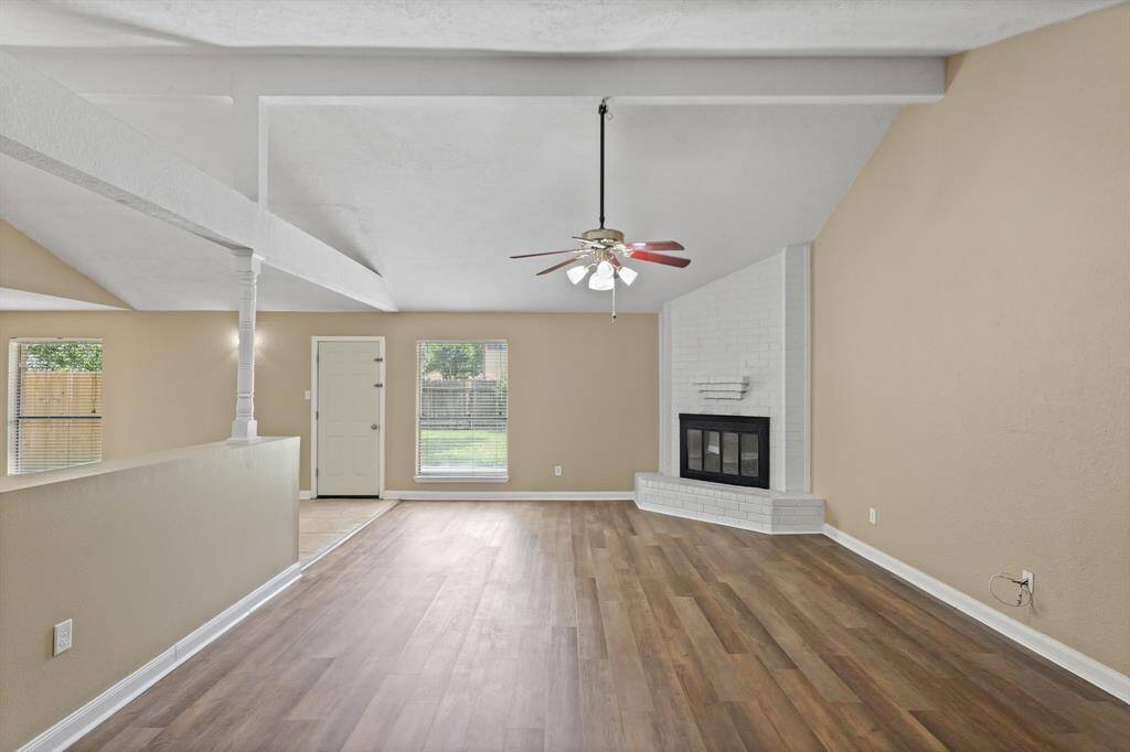 Step inside to new vinyl plank flooring throughout the home, along with fresh paint and beautiful fireplace as a focal point.