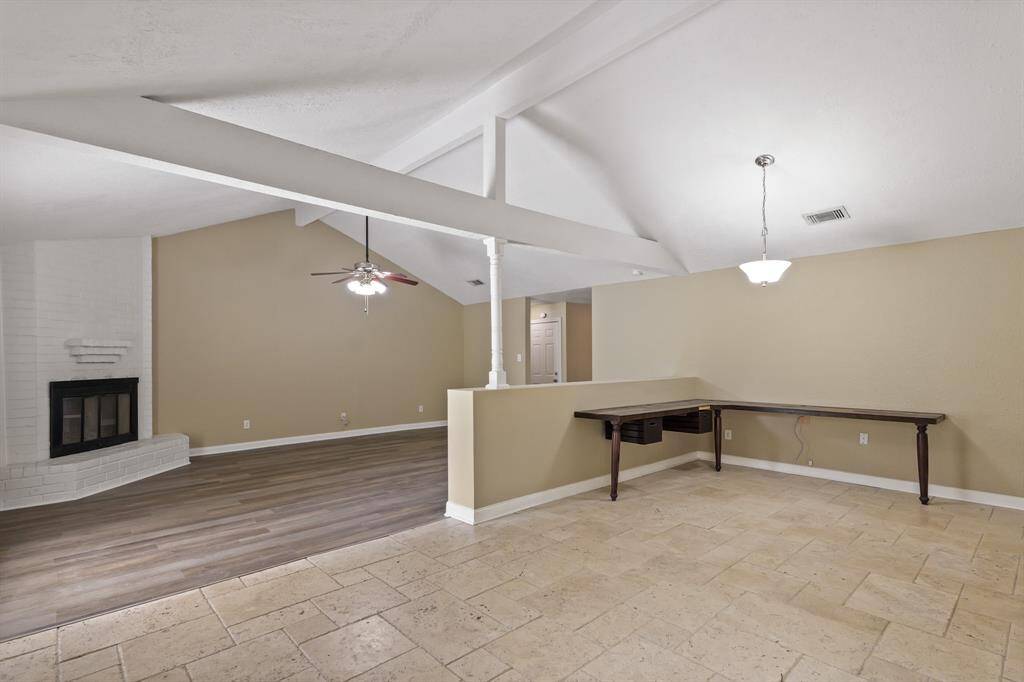 Large dining area can easily double as a workspace or more living space.