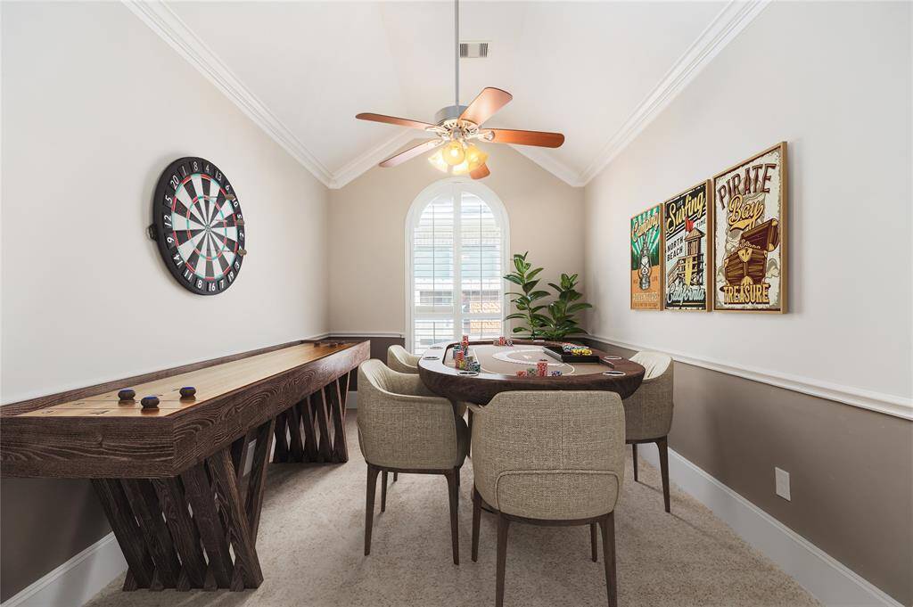 Virtual photo of formal dinning room turned into game room